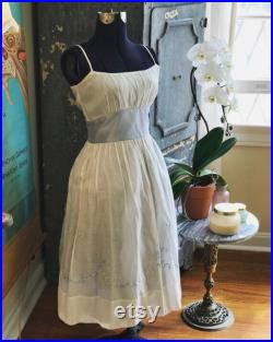 Antique dress form mannequin with cast iron base adjustable