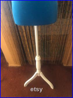 Blue Mannequin Torso with White Wooden Stand