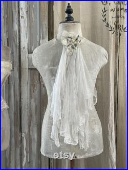 Old men's tailor doll in shabby dress