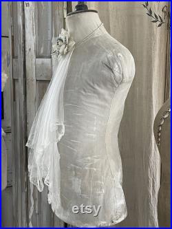 Old men's tailor doll in shabby dress