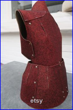 Old sewing mannequin in cardboard and red felt