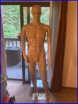 Realistic full body male mannequin with realistic facial features