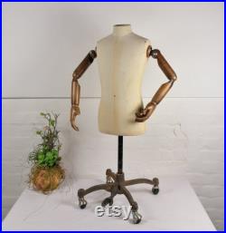 Vintage Mannequin with wooden arms on rolling base. Tailor's Dummy.