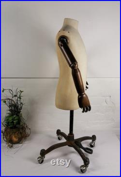 Vintage Mannequin with wooden arms on rolling base. Tailor's Dummy.