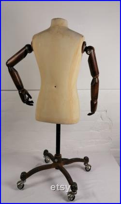 Vintage Mannequin with wooden arms on rolling base. Tailor's Dummy.