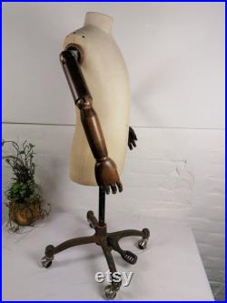 Vintage Mannequin with wooden arms on rolling base. Tailor's Dummy.