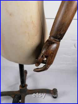 Vintage Mannequin with wooden arms on rolling base. Tailor's Dummy.