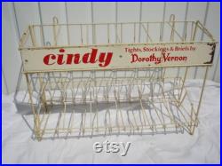 Vintage Stocking Display Rack with Unused stockings.