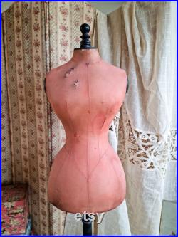 antique stockman wasp waist mannequin in original coral fabric