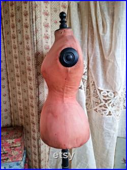 antique stockman wasp waist mannequin in original coral fabric